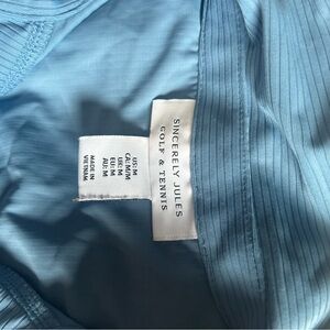 Blue collared golf and tennis shirt